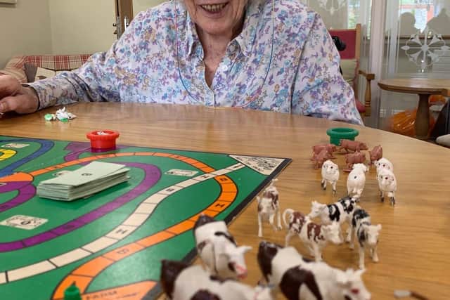 Jenny Mitchell-Jones playing Market Day at Colten Care’s Chichester care home Wellington Grange