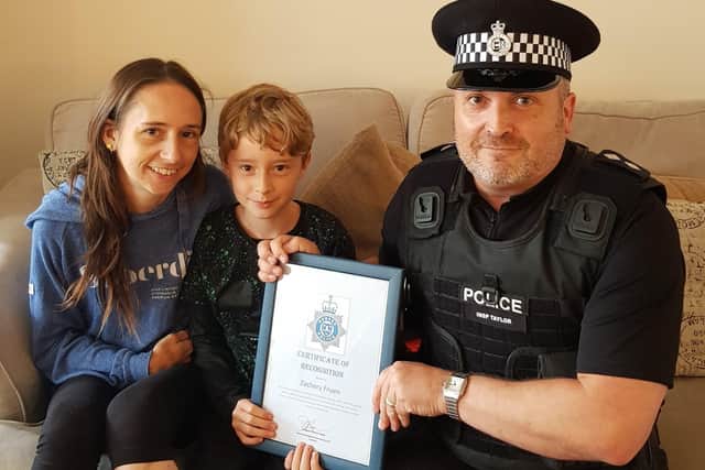 Inspector Darren Taylor hailed Zachary Fruen, nine, as a hero after he phoned 999 when his mum collapsed.