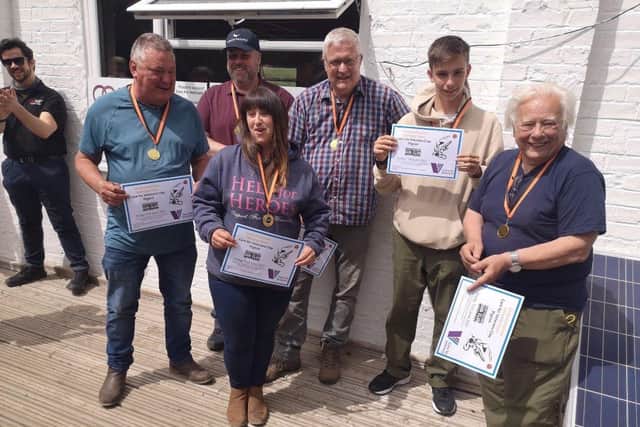 The highest scoring team, from left, Kev Newman, Russell Querns, Michelle Newman, Andy Slater, Harrison Baker and Roger Baker