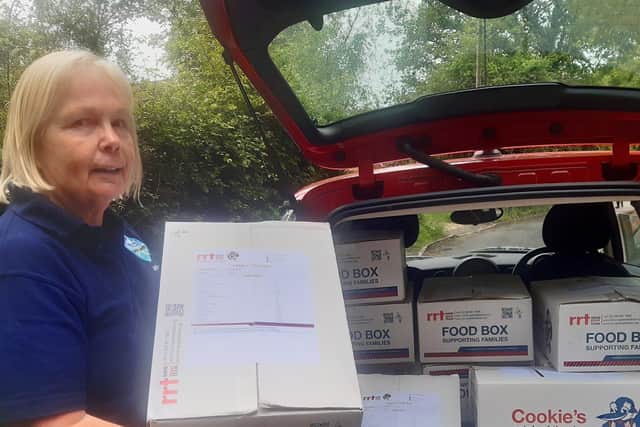 Burgess Hill Town Council and Jackie Cooper from Burgess Hill Youth gave out emergency food boxes SUS-210628-113509001