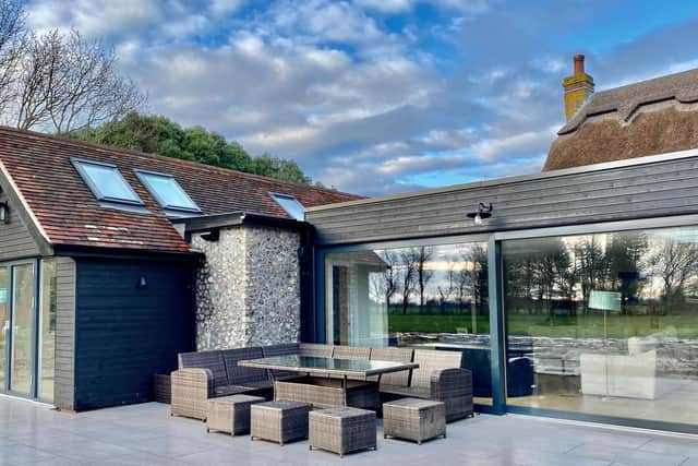 Bespoke Living was awarded the large renovation project prize for its work renovating a 300-year-old thatched cottage and building a contemporary two-storey, black Siberian larch-clad extension.
