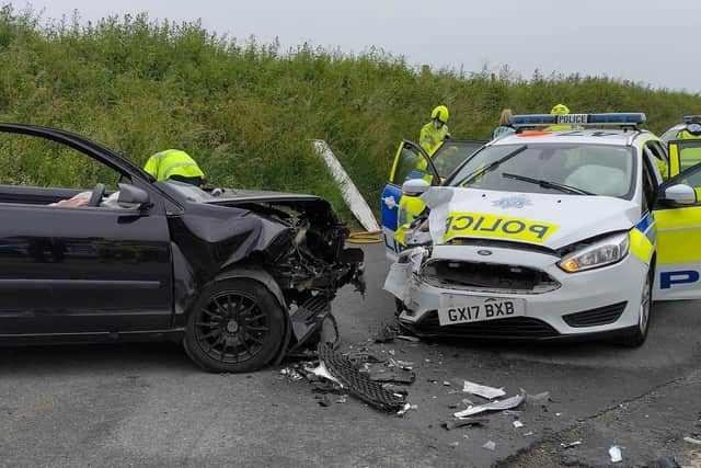 A police car was involved in a collision with a vehicle 'being driven by someone leaving the event'. Photo: Eddie Mitchell