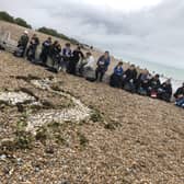 St Oscar Romero Catholic School on Goring beach as part of the SOS Day, thinking about sustainability and making Sussex knucker dragons