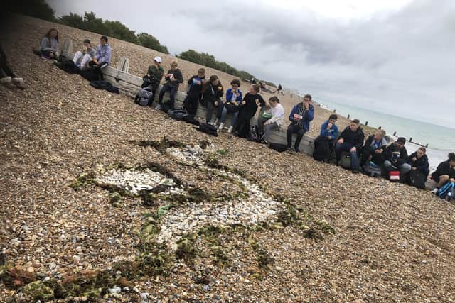St Oscar Romero Catholic School on Goring beach as part of the SOS Day, thinking about sustainability and making Sussex knucker dragons