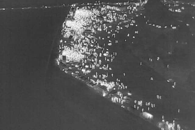 Thermal imaging shows the number of people who flocked to the countryside to join the illegal rave.