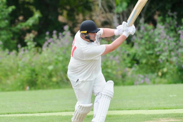 Ben West hits out in the Rustington - Steyning twos match / Picture: Stephen Goodger