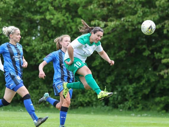 Kim Stenning powers a header home for Chichester & Selsey Ladies in their clash against Gillingham Women in 2019. Picture by Sheena Booker