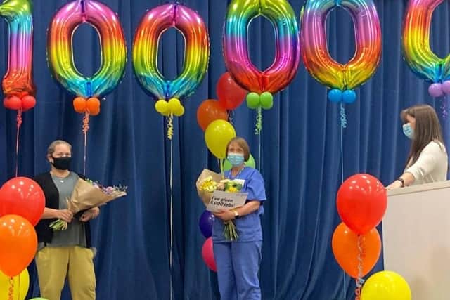 Sue Collins, who received the 100,000th jab at Clair Hall, with Fiona Hizzey, who administered her 5,000th dose. Picture: ABC
