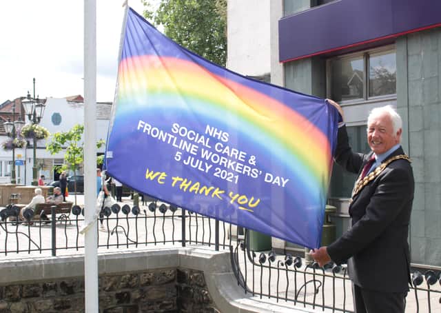 HDC chairman David Skipp with the specially designed flag
