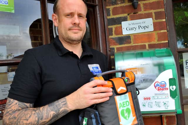 Landlord David Simmons at the Thatched Inn, Hassocks, with the new defibrillator. Picture: Steve Robards SR2107051.