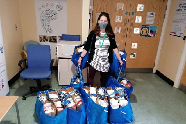 A little Bundles volunteer delivering bags of essential items to the birthing centre at St Richard's Hospital, Chichester MT9lU9G9Cow-2aApTG70