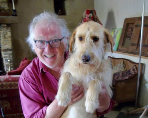 Chris Slade, of Worthing, with his dog, Rudy