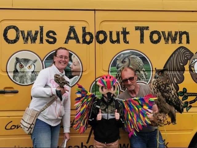 Arlan and his mum, Natalie, with Andy Kendall, from Owls About Town