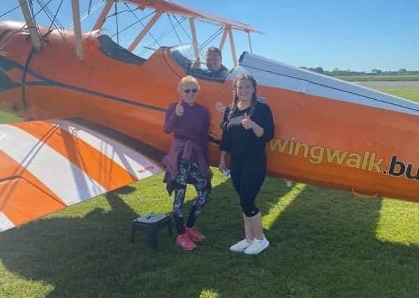 Louise and Daphne after their wing walk SUS-210707-125942001