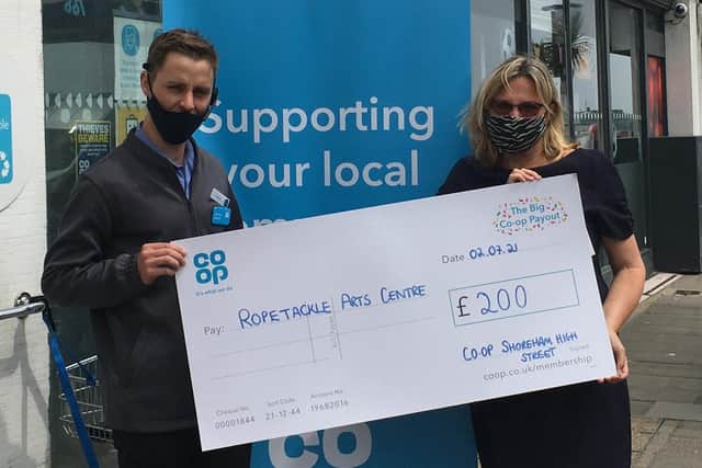 Jamie Lashmar, store manager at Co-op in Shoreham High Street, presenting the cheque to Nicky Thornton, marketing manager at Ropetackle Arts Centre