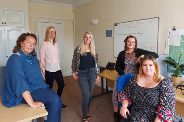 Help Point manager Abbie Wraige, centre, with the team based in Southwick