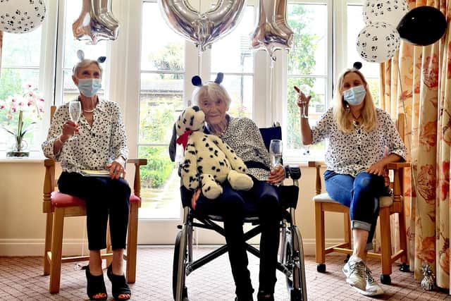Kit Downing celebrates her 101st birthday with daughter Ann Davis and granddaughter Emma Stokes