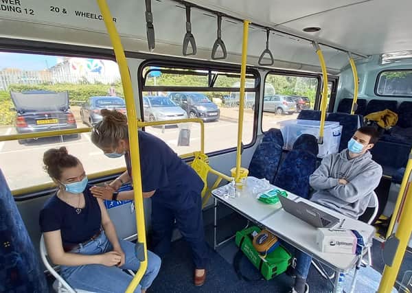 Jabs being administered on a bus in Hove