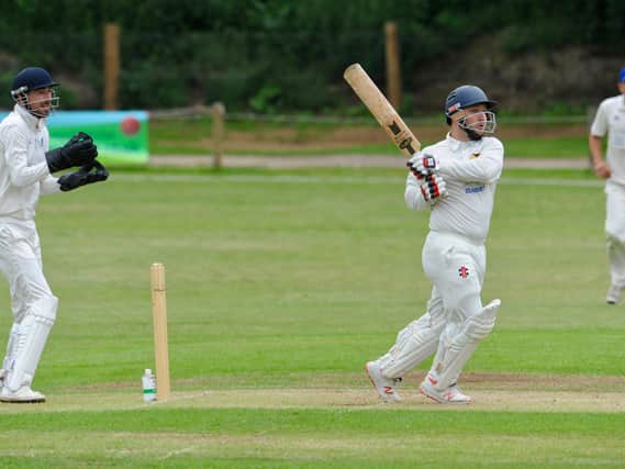 Dan Geer hits out in Findon's win over Goring / Picture: Stephen Goodger