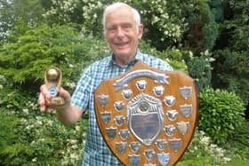 Phil with his shield and trophy, awarded for his work on telling the story of Albion legend Tommy Cook
