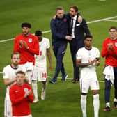 The England football team applauding fans after losing the Euro 2020 final on penalties to Italy Photo: John Sibley - Pool/Getty Images NNL-211207-101824001