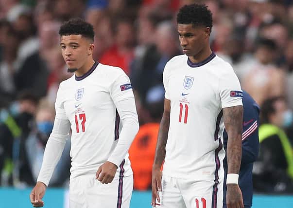 Jadon Sancho (left) and Marcus Rashford both received racist online abuse after their penalty misses in England's shootout defeat to Italy in the UEFA Euro 2020 final. Picture by Carl Recine - Pool/Getty Images