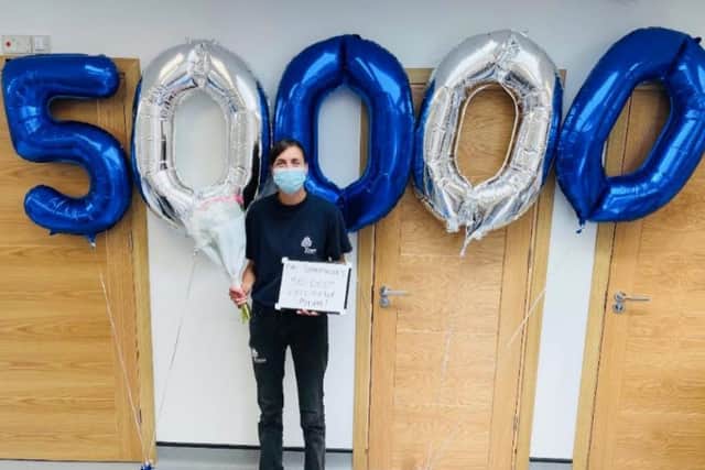 Vaccinator Paula Parker was on hand to administer the 50,000th dose to patient, Shona (pictured)