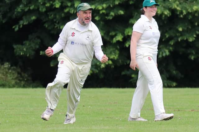 Skipper Scott Clark holds the winning catch for Lindfield CC 3rd XI against leaders Scaynes Hill CC 2nd XI