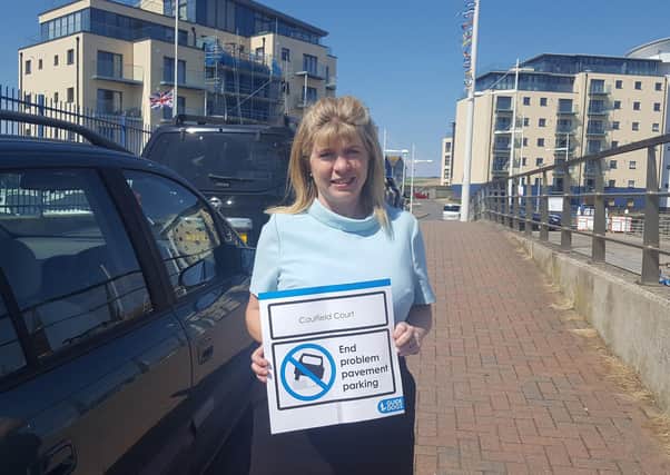 Maria Caulfield MP in Newhaven supporting Guide Dogs campaign against pavement parking