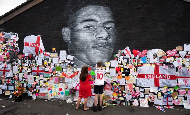 Hundreds of supportive messages have been left on the Marcus Rashford mural after it appeared vandalised on Monday after the UEFA Euro 2021 final. Photo credit: Danny Lawson/PA Wire SUS-210715-093145001