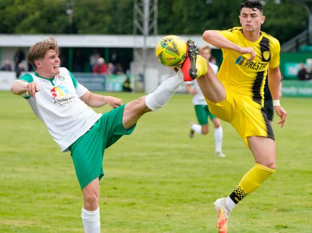 Action from Bognor's friendly loss to Burton / Picture: Lyn Phillips