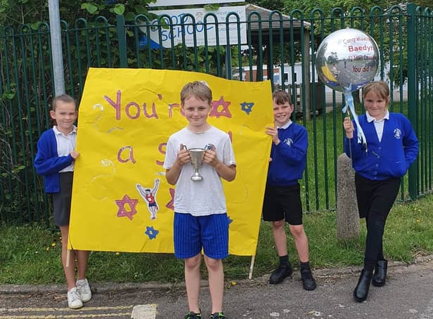 Baedyn ran the last mile at his school on Friday, June 30, 'with every student and member of staff out cheering him on'