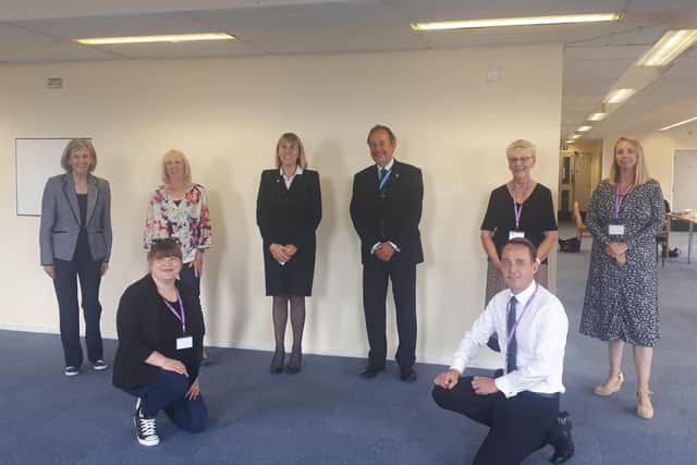 The High Sheriff for West Sussex Mr. Neil Hart with Coroners’ Courts Support Service volunteers with their badges