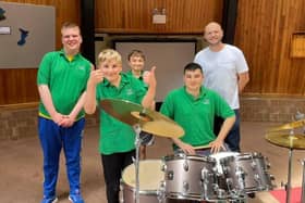 Co-founder of Drum Hangs, Russ Gleason, presents students from LVS Hassocks with a new drum kit SUS-210719-134131001