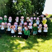 Greenway Academy pupils with their 3D self-portraits which they created as part of an exhibition alongside other Horsham pupils who were once again unable to take part in Horsham's children's parade due to the coronavirus SUS-210720-140212001