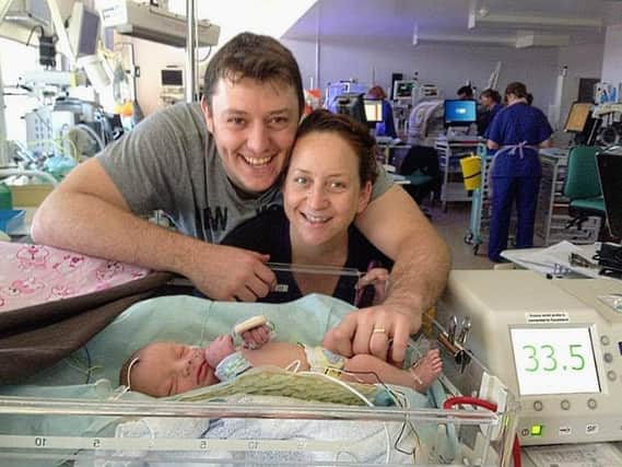 Greg Bower, wife Mel and daughter Ellie, when she received the life-saving treatment in Brighton