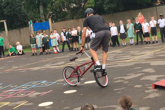 Former world champion BMX rider Mike Mullen showed children tricks on their bikes when he spent the day at The Laurels Primary School in Worthing
