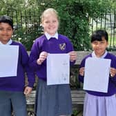 Short story competition winners from St Mary’s Catholic Primary School in Worthing, from left, Lakmudu, Vilte and Isali