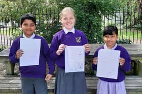 Short story competition winners from St Mary’s Catholic Primary School in Worthing, from left, Lakmudu, Vilte and Isali