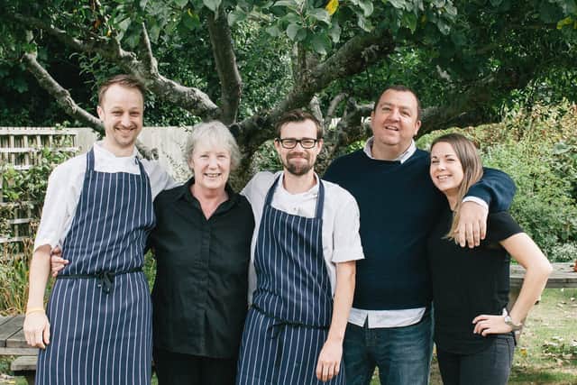 Owner Dominic Worrall with general manager Molly Raftery and the rest of the team at The Bull in Ditchling. Picture: Emma Gutteridge, www.emmagutteridge.com.
