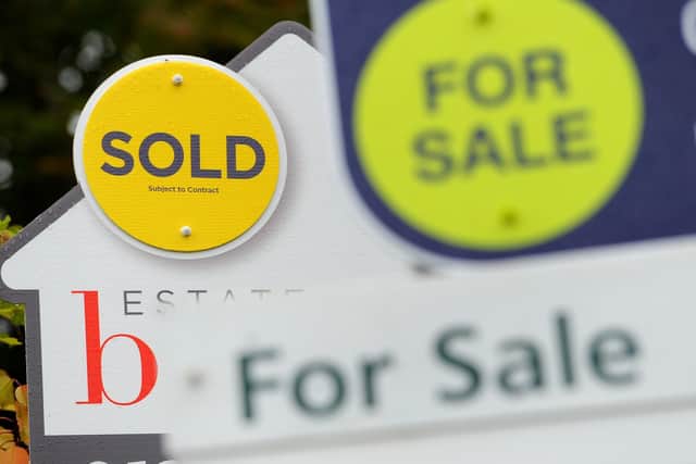 File photo dated 14/10/14 of sold and for sale signs. House prices across the UK are expected to increase by 4 percent this year, according to a property group's forecasts. Issue date: Tuesday March 9, 2021. SUS-210527-165735001