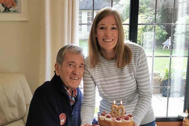 Marcella Bilsby with her father Daniel Clark on his 80th birthday. SUS-210726-104424001