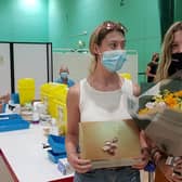 Lauren Baylis a 31 year old from Worthing accompanied by her twin sister Sigourney who was also being vaccinated were both there for the Pfizer jab.