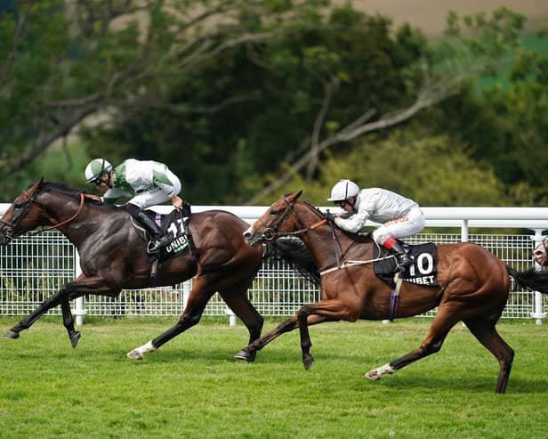 Pat Dobbs riding Beat Le Bon (L) to win the Unibet Golden Mile Handicap at Goodwood in 2019 / Picture: Getty