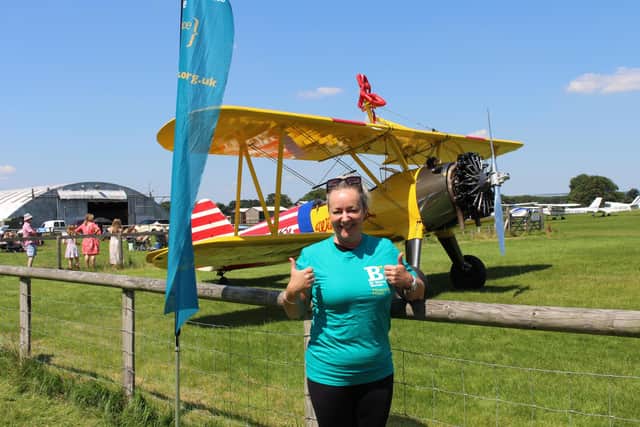 Michaela Mson from Horsham did a wing walk for St Barnabas House hospice SUS-210727-111317001