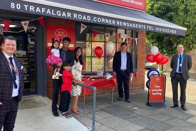 The new Trafalgar Road Post Office in Horsham: Post Office network provision manager Jason Collins, postmasters  Chirag  and ShraddhaThakkar with their children Risha and Rishan, Horsham MP Jeremy Quin, and  Post Office area manager Steve Leddy SUS-210727-111405001