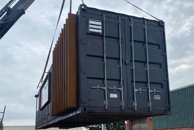 The cafe in Climping will be made out of shipping containers, pictured