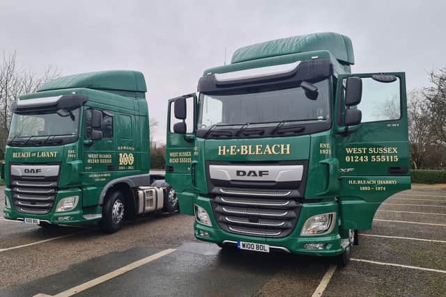 Two new trucks commissioned for Bleach of Lavant Ltd’s centenary. In honour of the two founding members of the company, Harry and Lawrence Bleach, one truck bears the initials H.E. Bleach and the other L.RJ. Bleach. Image courtesy of Bleach of Lavant Ltd.