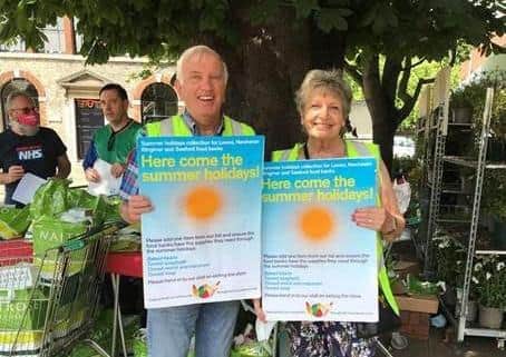The Rotary Club of Lewes president Peter Gartell and secretary Carole Gartrell staffing the food bank collection outside Waitrose. SUS-210728-093245001