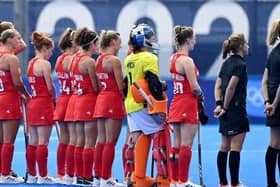 Maddie Hinch (in yellow) lines up for Great Britian women's hockey team against India. Picture courtesy of England Hockey